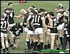 Aussie Rules player checking cock n balls.JPG